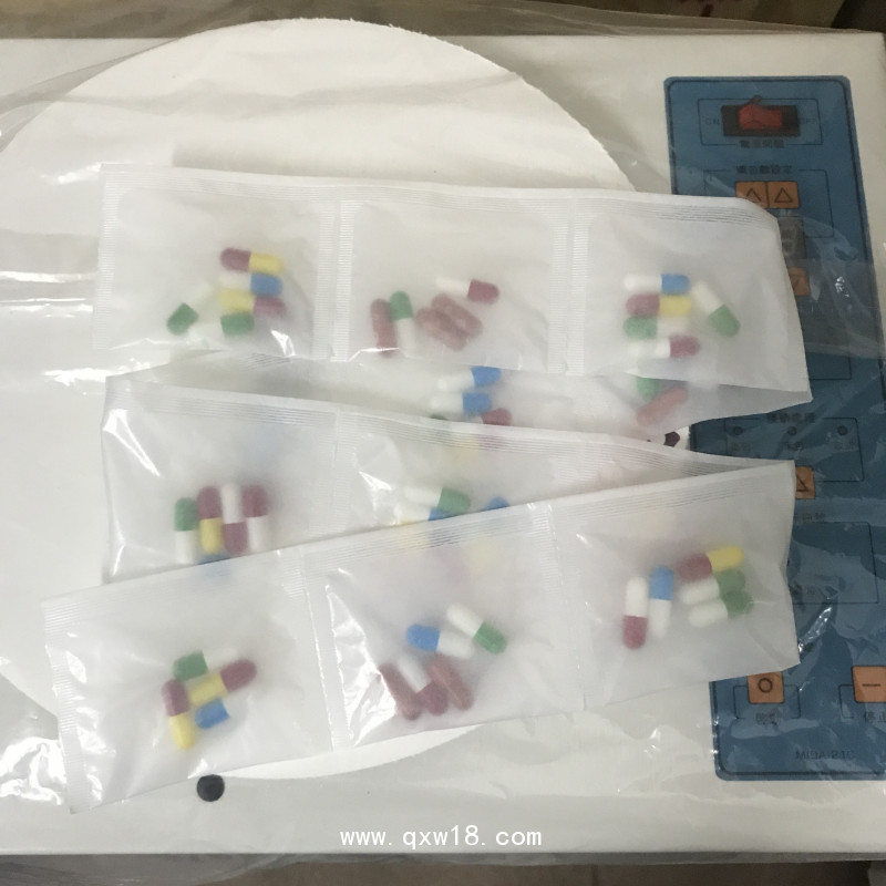 臺灣新山XS-21S桌上型自動包藥機(jī)西藥片劑膠囊藥粉中藥顆粒
